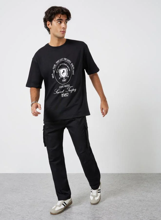 ستايلي تيشيرت بطبعة جرافيك قصة واسعة